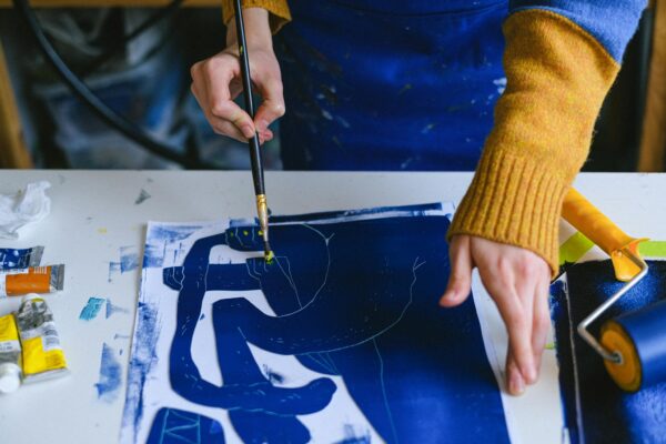 Artist painting picture for new project