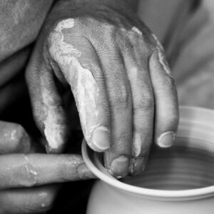 Person Forming Clay Pot